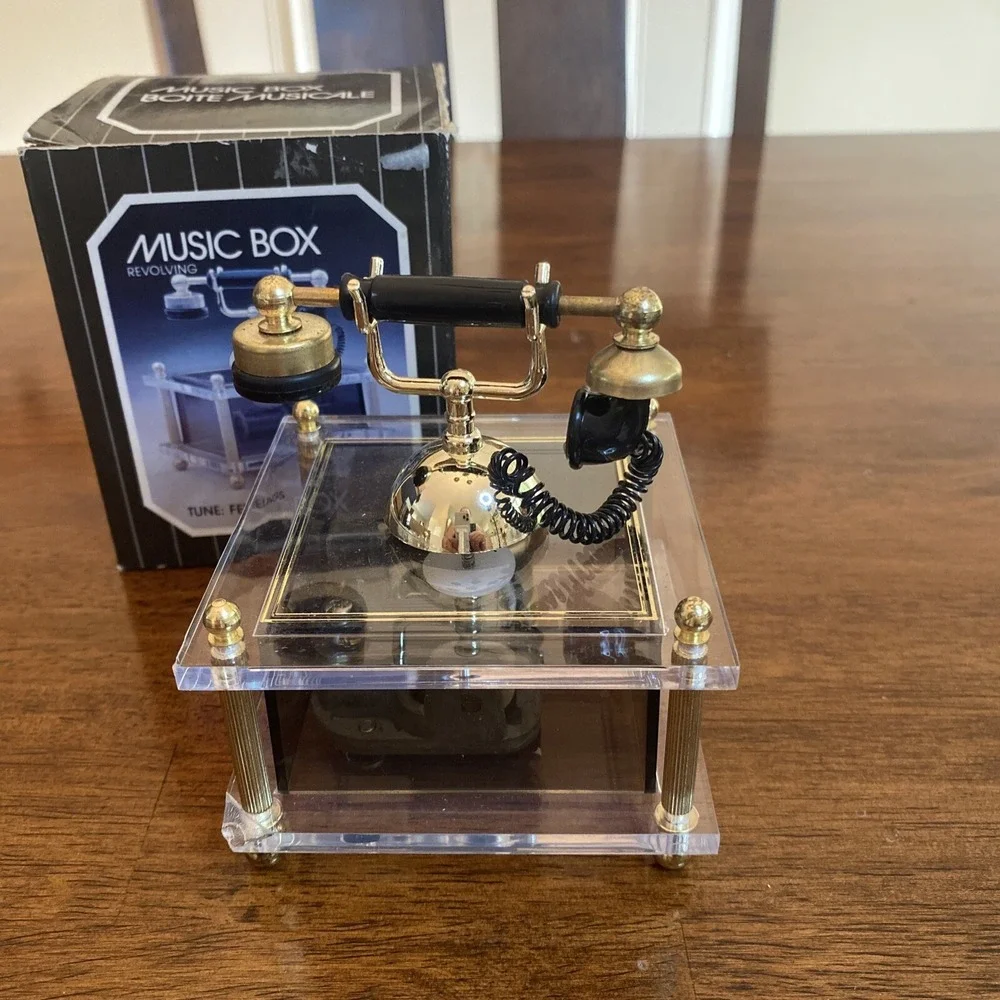 Musical Revolving Telephone With Gold Accents Song (Fillings)